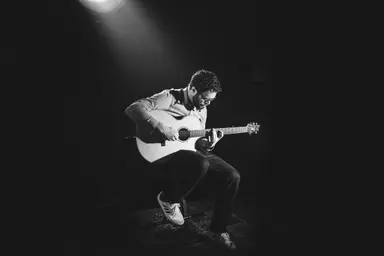 Couple playing guitar